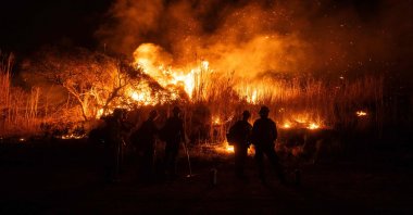 Firefighters monitor and control the spread of the Auto Fire in Oxnard, North West of Los Angeles, California, Jan. 13, 2025. (AFP Photo)