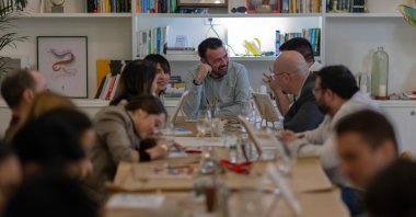 A group of people take part in a singles meeting organized by the &quot;Slow Dating Club,&quot; Madrid, Spain, Dec. 29, 2024. (AFP Photo)