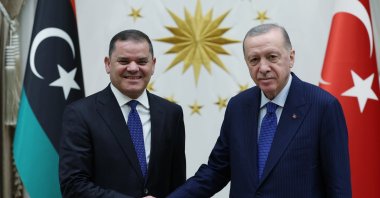 President Recep Tayyip Erdoğan and Libyan Prime Minister Abdul Hamid Mohammed (L) shake hands at the Presidential Complex, Ankara, Türkiye, Jan. 15, 2025. (AA Photo)