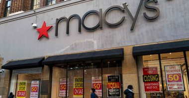 People walk by a Macy&#039;s store in Brooklyn after the company announced it was closing the store along with over 60 others in New York City, U.S., Jan. 13, 2025. (AFP Photo)
