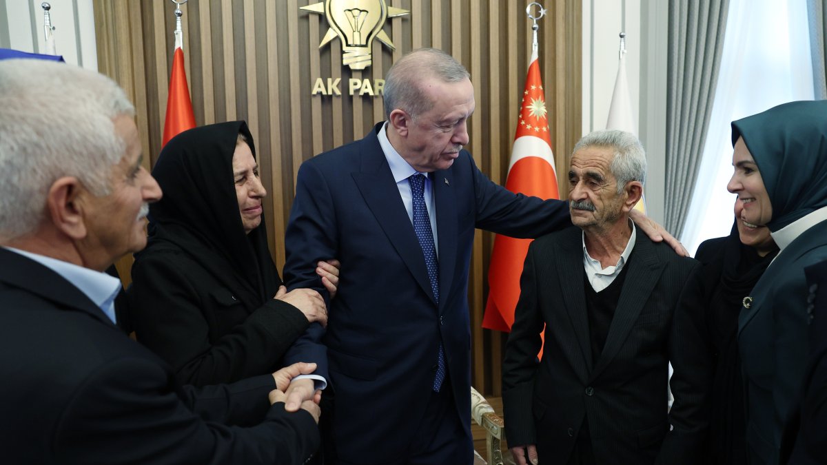 President Recep Tayyip Erdoğan chats with families of PKK victims, Ankara, Türkiye, Jan. 14, 2025. (AA Photo)