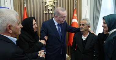 President Recep Tayyip Erdoğan chats with families of PKK victims, Ankara, Türkiye, Jan. 14, 2025. (AA Photo)
