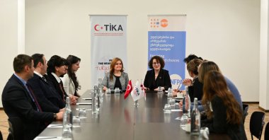 Authorities from the Turkish Cooperation and Coordination Agency (TIKA) and the United Nations Population Fund (UNFPA) sign a cooperation protocol, Tbilisi, Georgia, Jan. 16, 2025. (IHA Photo)