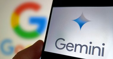 A Google logo and illustration of AI model Gemini 2.0 is seen in Suqian, Jiangsu, China, Dec. 12, 2024. (Reuters Photo)