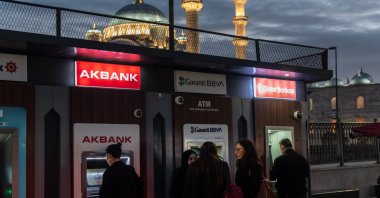 Customers use the Turkish bank ATMs on the European side of Istanbul, Türkiye, Jan. 7, 2025. (Reuters Photo)