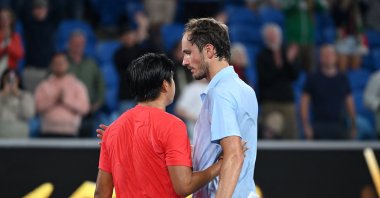 Learner Tien of the U.S. hugs Russia&#039;s Daniil Medvedev after winning his second-round match of the Australian Open at Melbourne Park, Melbourne, Australia, Jan. 16, 2025. (Reuters Photo)