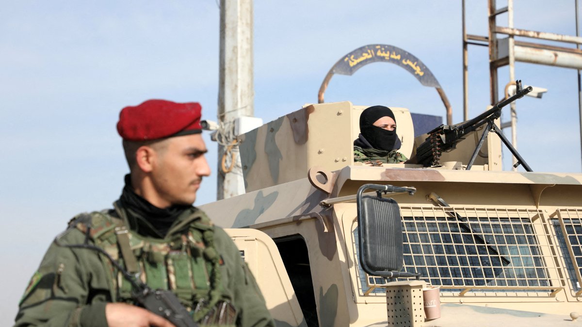 A member of the PKK/YPG terrorist group stands near a street after anti-regime forces seized the capital and ousted Bashar Assad, Hassakeh, Syria, Dec. 11, 2024. (Reuters Photo)