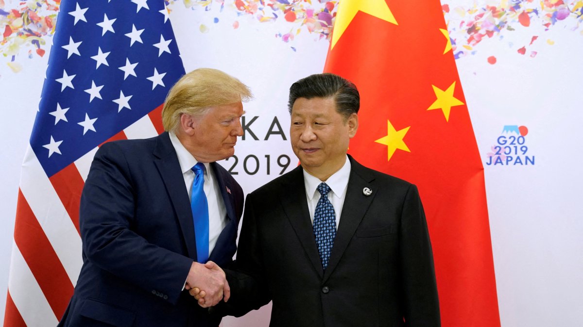 Then-U.S. President Donald Trump and China&#039;s President Xi Jinping shake hands ahead of their bilateral meeting during the G20 leaders summit in Osaka, Japan, June 29, 2019. (Reuters File Photo)
