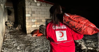 A Turkish Red Crescent team provides aid in an earthquake-affected region, Türkiye, March 10, 2024. (AA Photo)