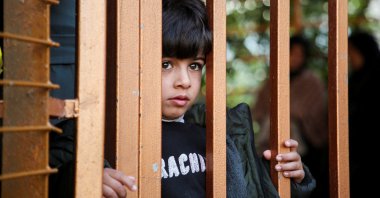 A boy looks on near the bodies of Palestinians killed in Israeli airstrikes, at Al-Nasser Hospital, Khan Younis, southern Gaza Strip, Palestine, Jan. 17, 2025. (Reuters Photo)