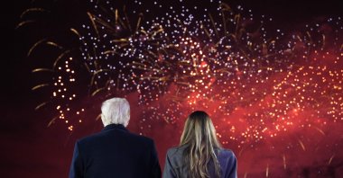 U.S. President-elect Donald Trump and his wife, Melania Trump, watch fireworks during a reception in his honor at Trump National Golf Club Washington D.C., Sterling, Virginia, U.S., Jan. 18, 2025. (AFP Photo)