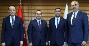 Industry and Technology Minister Mehmet Fatih Kacır (2-L), TUA President Yusuf Kıraç (L) and Axiom Space Chief Revenue Officer Tejpaul Bhatia (2-R) pose for a photo as Turkish Space Agency (TUA) and Axiom Space sign memorandum of understanding for cooperation, at an undisclosed location, Jan. 18, 2025. (AA Photo)