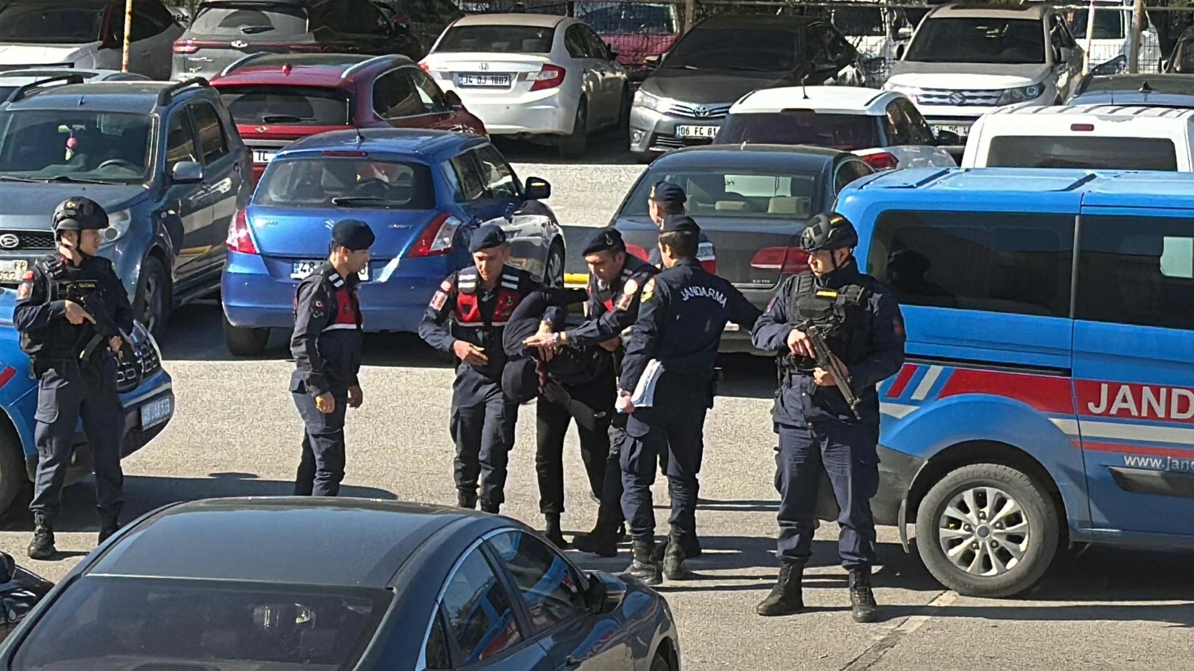 Turkish authorities escort Swedish fugitive Michael Lindström after an Interpol alert prompts his arrest, Bodrum, Muğla, southwestern Türkiye, Jan. 20, 2025. (DHA Photo)