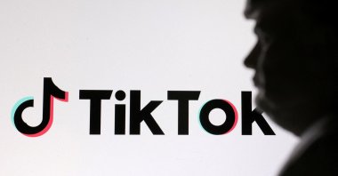 A 3D-printed miniature model of U.S. President-elect Donald Trump and TikTok logo are seen in this illustration taken Jan. 19, 2025. (Reuters Photo)