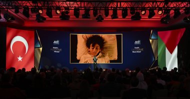 Palestinian singer Llunr performs his song at the TRT World Citizen Awards ceremony in Istanbul, Türkiye, Jan. 17, 2025. (AA Photo)