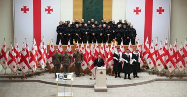 President Mikhail Kavelashvili (C) takes the oath during his swearing-in ceremony at the parliament, Tbilisi, Georgia, Dec. 29, 2024. (AFP Photo)