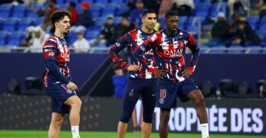 Paris Saint-Germain&#039;s players warm up before the start of the French Champions&#039; Trophy final in Doha, Qatar, Jan. 5, 2025. (AFP Photo)