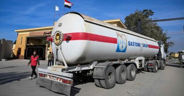 A fuel truck crosses into Gaza from the Egyptian side of the Rafah border crossing in Rafah on Jan.19, 2025.  (AFP Photo)