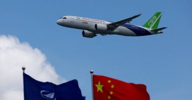 A Comac C919 flies during an aerial display at the Singapore Airshow at Changi Exhibition Centre, Singapore, Feb. 20, 2024. (Reuters Photo)