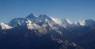 Mount Everest, the world highest peak, and other peaks of the Himalayan range are seen through an aircraft window during a mountain flight from Kathmandu, Nepal, Jan. 15, 2020. (Reuters Photo)