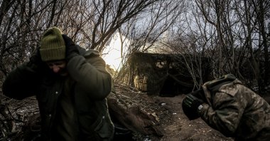 Servicemen of the 24th Mechanized Brigade, named after King Danylo, of the Ukrainian Armed Forces, fire an M109 Paladin self-propelled howitzer toward Russian troops in a front line amid Russia&#039;s attack on Ukraine, near the town of Chasiv Yar, Donetsk region, Ukraine, Jan. 16, 2025. (Reuters Photo)