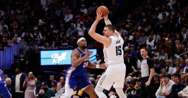Denver Nuggets center Nikola Jokic (15) controls the ball as Philadelphia 76ers forward Guerschon Yabusele (28) guards in the third quarter at Ball Arena, Denver, Colorado, U.S., Jan 21, 2025. (Reuters Photo)