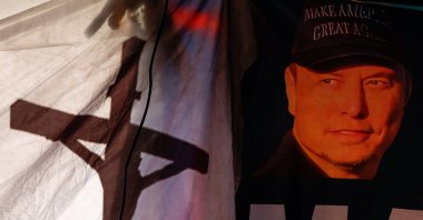 Merchandise with an image of Tesla CEO and X owner Elon Musk is displayed on the inauguration day of Donald Trump&#039;s second presidential term, Washington, U.S., Jan. 20, 2025. (Reuters Photo)