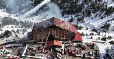 A drone-captured view shows the hotel engulfed in smoke at Kartalkaya Ski Resort, Bolu, northwestern Türkiye, Jan. 21, 2025. (AA Photo)