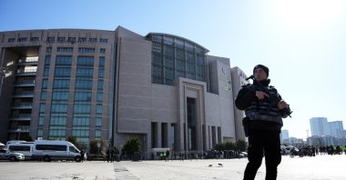 A police officer stands guard outside the Çağlayan courthouse after a terrorist attack, Istanbul, Türkiye, Feb. 6, 2024. (IHA Photo)