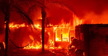 A home is engulfed in flames during the Eaton fire in Pasadena, California, U.S., Jan. 7, 2025. (AFP Photo)