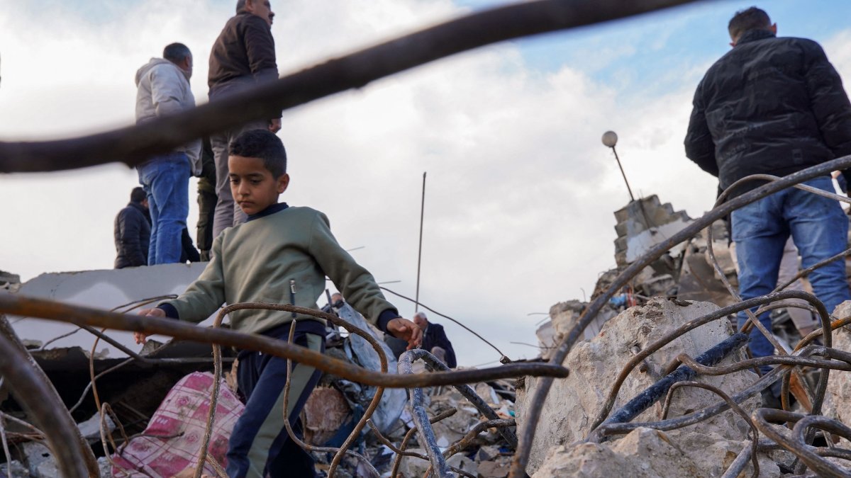 People inspect the rubble of a house where two Palestinians were in an Israeli raid in Burqin village near Jenin in the occupied West Bank, Palestine, Jan. 23, 2025. (AFP Photo)