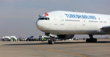Passengers disembark from a Turkish Airlines aircraft carrying a diplomatic delegation from Ankara and an aid shipment provided by the Turkish Red Crescent at Damascus International Airport, Damascus, Syria, Jan. 23, 2025. (AFP Photo)