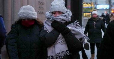 People walk down the sidewalk during an extreme cold warning as a winter storm passes through Toronto, Ontario, Canada, Jan. 22, 2025. (Reuters Photo)