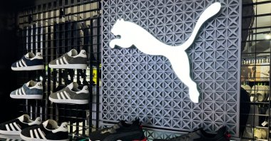Puma shoes and its logo are seen at a store, Nice, France, May 28, 2024. (Reuters Photo)