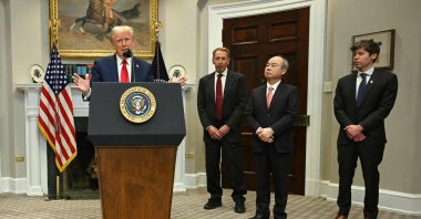 U.S. President Donald Trump speaks in the Roosevelt Room flanked by Masayoshi Son (2nd R), chair and CEO of SoftBank Group Corp, Larry Ellison (2nd L), executive chair of Oracle, and Sam Altman (R), CEO of Open AI, at the White House, Washington, U.S., Jan. 21, 2025. (AFP Photo)