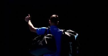 Serbia&#039;s Novak Djokovic gestures to the crowd as he leaves the court after retiring from his semi final match against Germany&#039;s Alexander Zverev, Melbourne, Australia, Jan. 24, 2025. (Reuters Photo)
