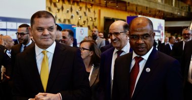 Libyan Prime Minister Abdul Hamid Mohammed Dbeibah (L) and Libyan Acting Oil and Gas Minister Khalifa Abdulsadek attend the Libya Energy and Economy Summit, Tripoli, Libya, Jan. 18, 2025. (AA Photo)