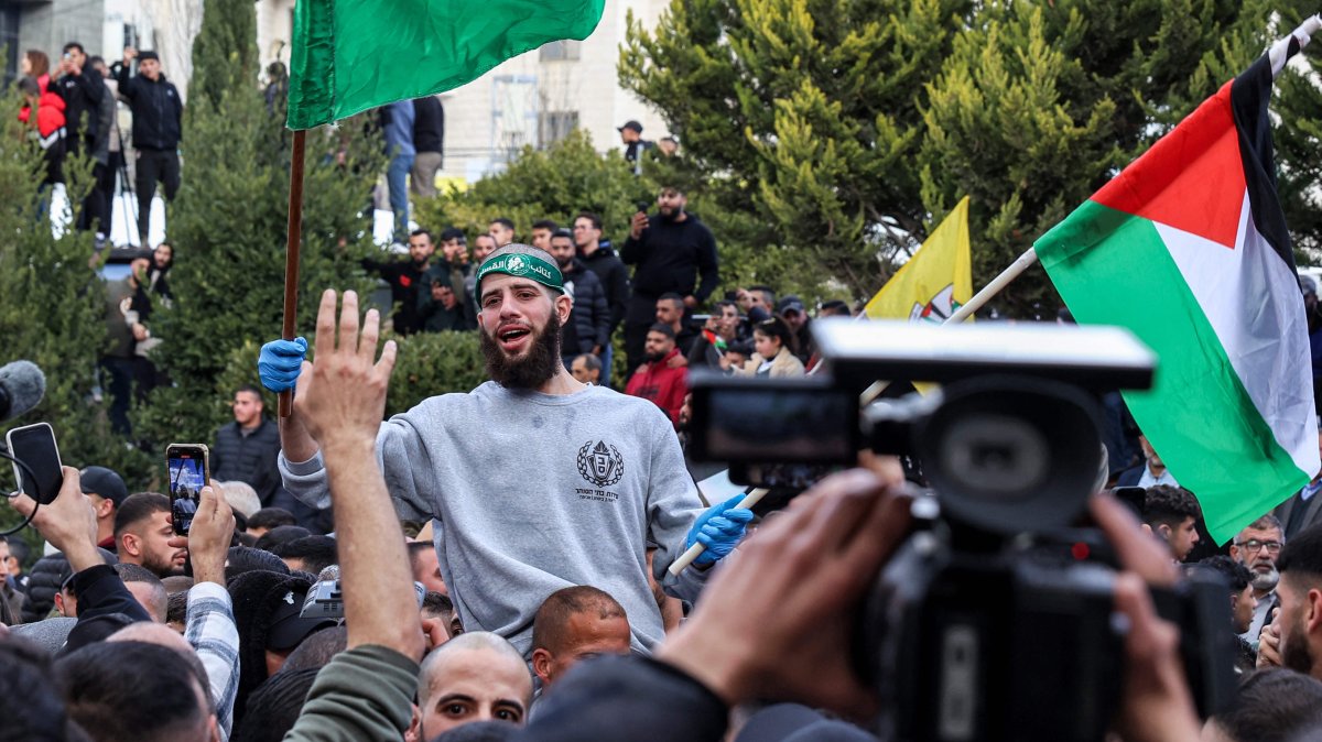 A Palestinian prisoners released by Israel reacts while being carried on people&#039;s shoulders in Ramallah, occupied West Bank, Jan. 25, 2025. (AFP Photo)