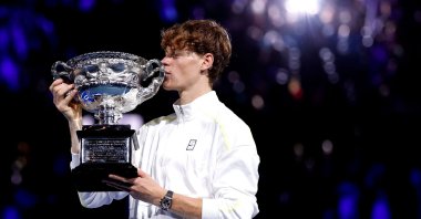 Italy's Jannik Sinner celebrates with Australian Open trophy after defeating Germany's Alexander Zverev in the final, Melbourne, Australia, Jan. 26, 2025. (AFP Photo)