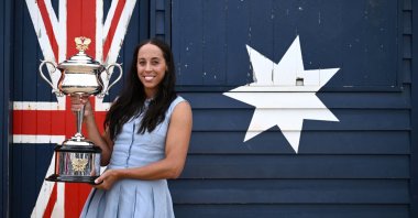 U.S.' Madison Key poses with the Australian Open women's title, in Melbourne, Australia, Jan. 26, 2025. (EPA Photo)