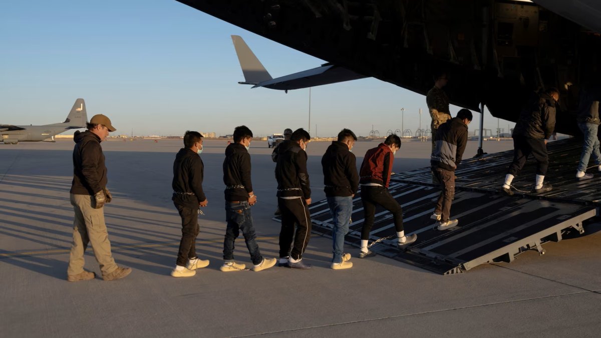 Migrants board a C-17 Globemaster III aircraft for a removal flight, Fort Bliss, Texas, January 23, 2025. (Reuters Photo)