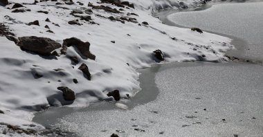 Melting ice of a small pool of the Schneeferner Glacier below Germany&#039;s highest mountain Zugspitze, near Garmisch-Partenkirchen, Germany, Sept. 26, 2023. (EPA Photo)