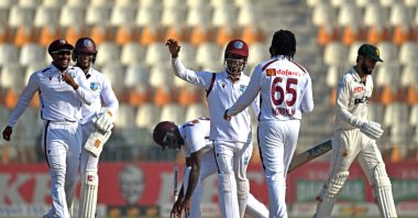West Indies players celebrate the dismissal of Pakistan's Kashif Ali (R) during the third day of the second Test match, in Multan, Pakistan, Jan. 27, 2025. (AFP Photo)