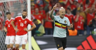 Belgium&#039;s Radja Nainggolan celebrates scoring against Wales in the Euro 2016 quarterfinals, Lille, France, July 1, 2016. (AP Photo)