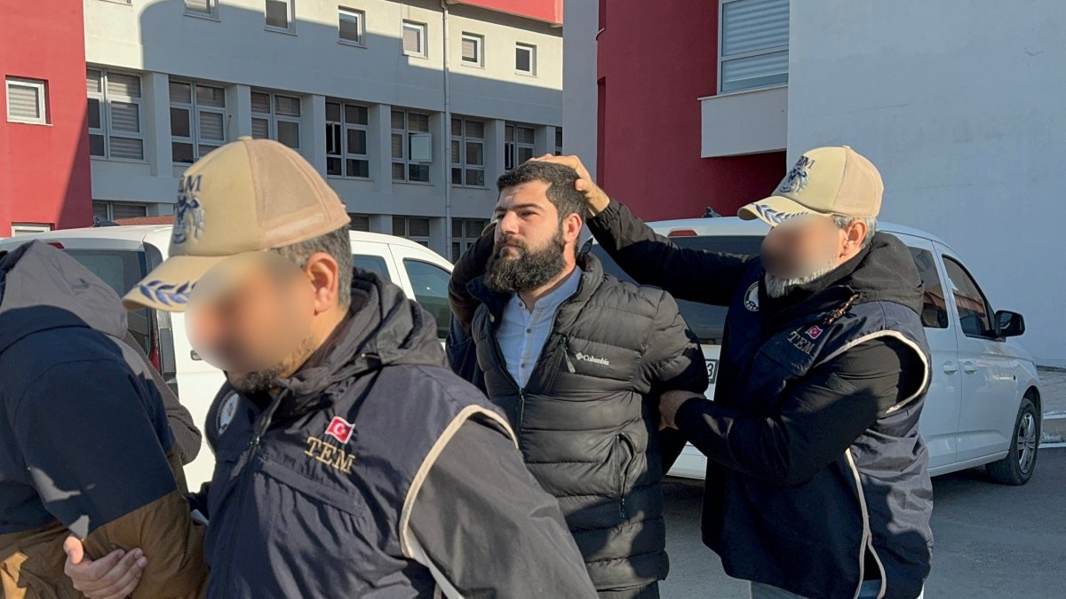 Police arrest a suspected Daesh member in the southern Adana province, Türkiye, Jan. 6, 2025. (AA Photo)