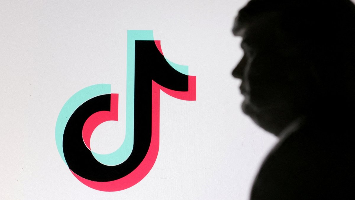 A 3D-printed miniature model of U.S. President-elect Donald Trump and TikTok logo are seen in this illustration taken Jan. 19, 2025. (Reuters Photo)