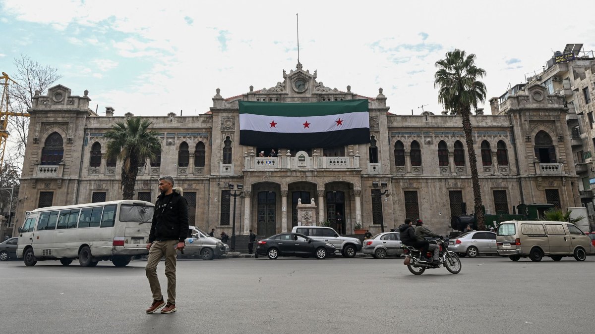 People walk in front of the historic Hejaz train station in Damascus, Syria, Jan. 26, 2025. (AFP Photo)