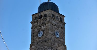 The restored Clock Tower with its newly installed clockface that occasionally stops due to power outages, Antalya, Türkiye, Jan. 20, 2025. (DHA Photo)