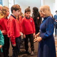 Britain&#039;s Queen Camilla (R) speaks with school children as she attends a reception, hosted by the Anne Frank Trust to mark Holocaust Memorial Day, Hilton Park Lane, London, U.K., Jan. 23, 2025. (AFP Photo)