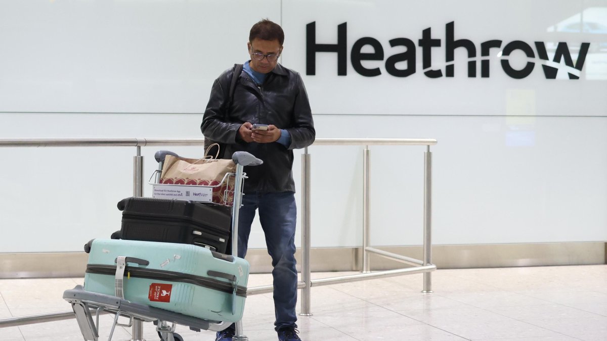 A passenger at the International Arrivals area of Terminal Two at Heathrow Airport near London, U.K., Jan. 22, 2025. (EPA Photo)